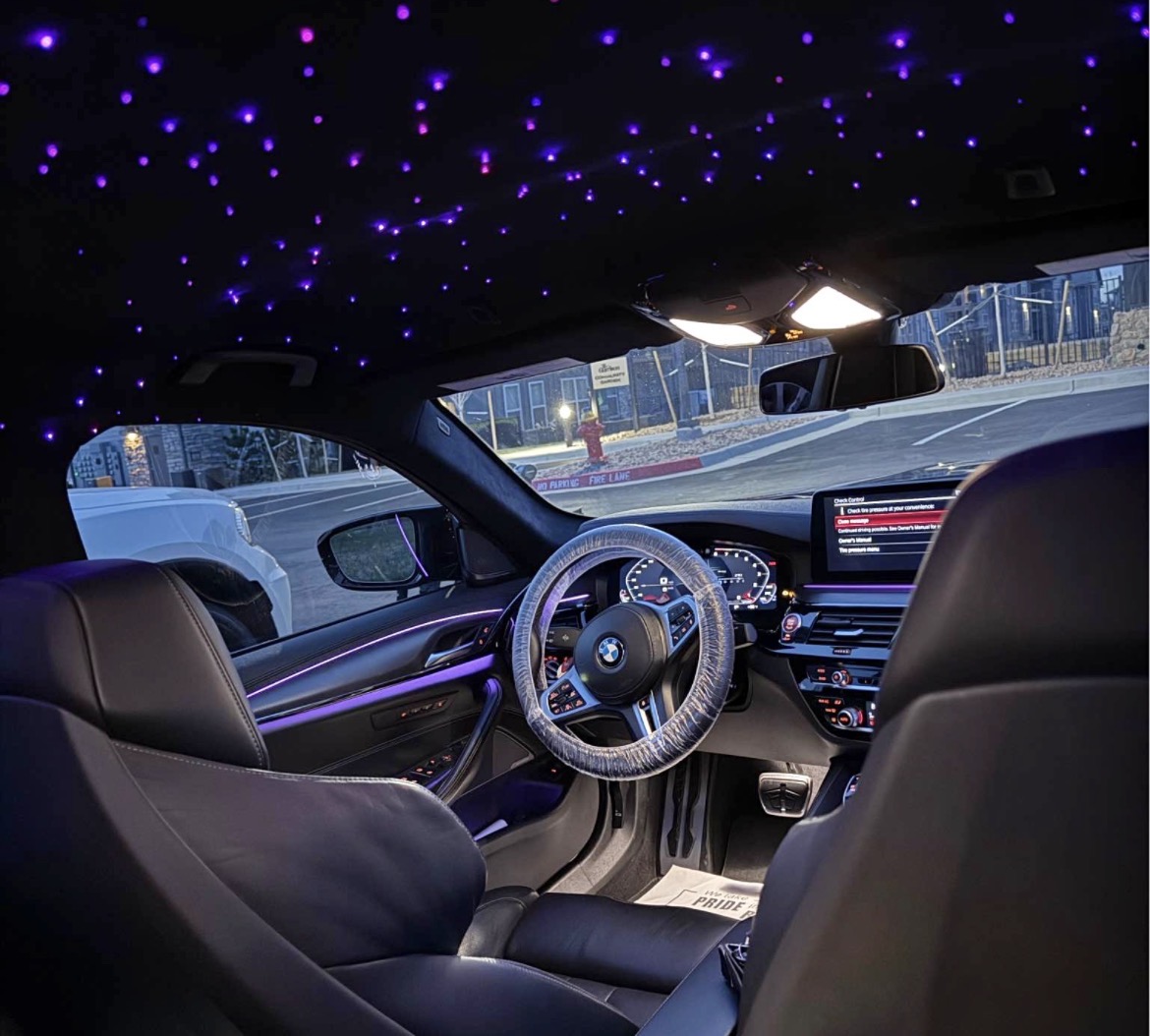 Detailed BMW interior with ambient lighting